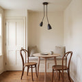 2-Light Brass Sputnik Dining Chandelier in a room