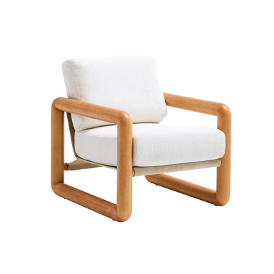 Romy accent chair with a solid wood frame and boucl&eacute; cushions