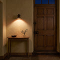 Articulated Wall Lamp – Mid-Century Modern Brass Sconce in a room