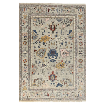 Artisan Hand-Knotted Traditional Rug, full view on a white background