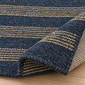 Boho Chic Jute Stripe Rug - Stylish and Sustainable Floor Decor, folded corner showing the back