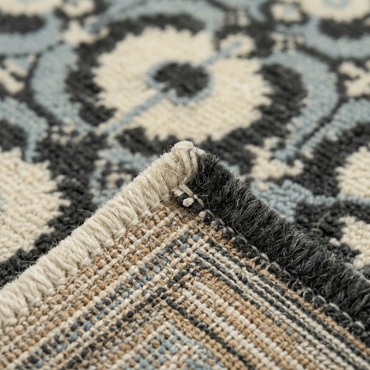 Casavani Turkish Tribal Rug, folded corner showing the back