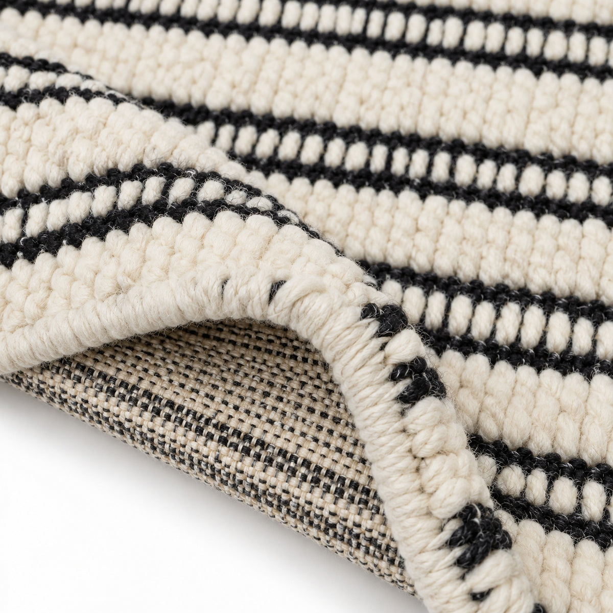 Custom white Jute Rug - Handcrafted Natural Fiber Accent Piece, folded corner showing the back