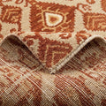 Ella Red Beige Hand Knotted Rug, folded corner showing the back