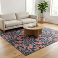 Floral Pink Hand knotted Rug in a living room