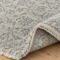 Gray Silver Floral Traditional Faded Color Hand Knotted Rug, folded corner showing the back