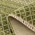 Green Bedroom Area Geometric Rug, folded corner showing the back