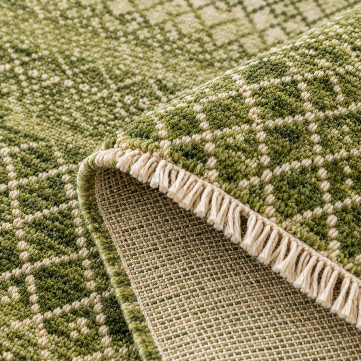 Green Bedroom Area Geometric Rug, folded corner showing the back