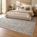 Irradiant Ivory Charcoal Rug in a bedroom
