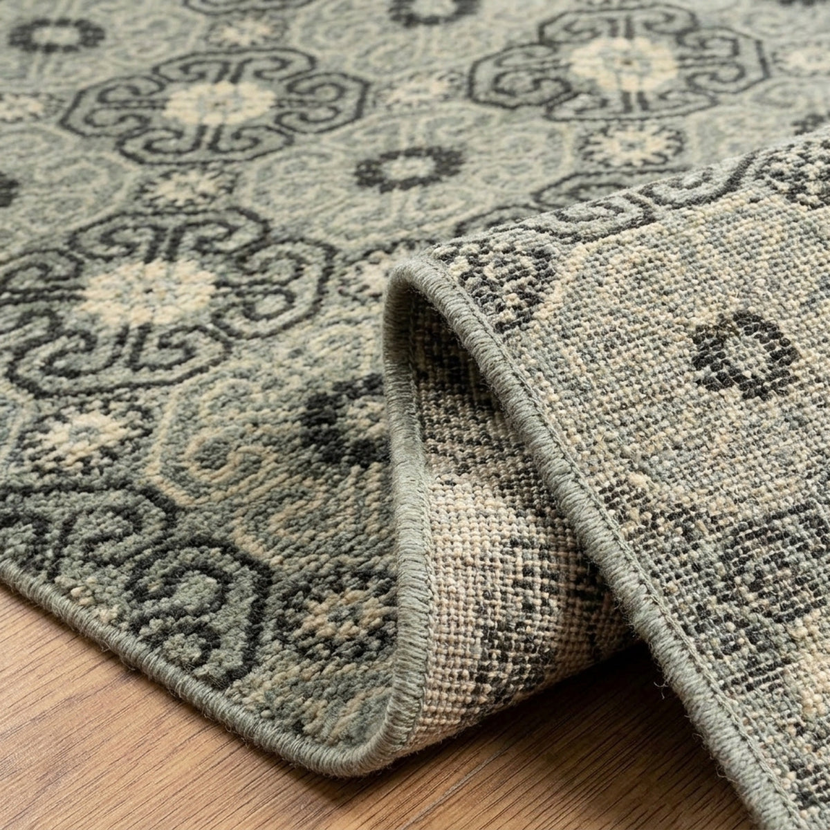 Ishahan Ikat Persian Style Rug, folded corner showing the back