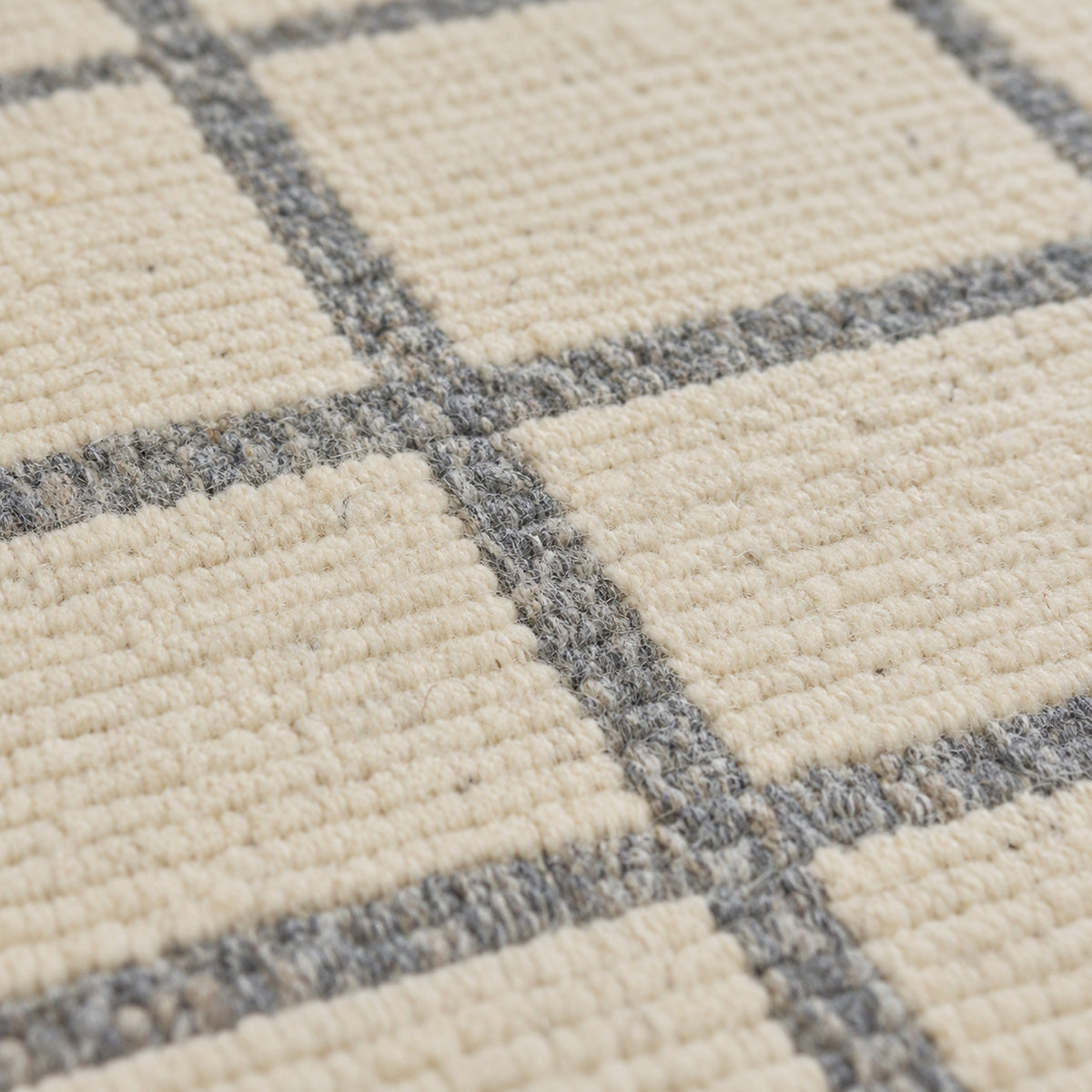 Ivory Grey Hand Loom Rug, close up of the texture