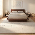 Ivory Stramlined Rug in a bedroom