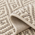 Jute and Cotton Blend Rug - Soft and Versatile Home Decor, folded corner showing the back