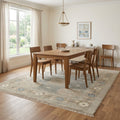 Khotan Faded Ivory Turkish Hand knotted Rug in a dining room