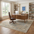Khotan Faded Ivory Turkish Hand knotted Rug in a home office