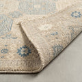 Khotan Faded Ivory Turkish Hand knotted Rug, folded corner showing the back