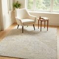 Linear ivory striped rug in a reading nook
