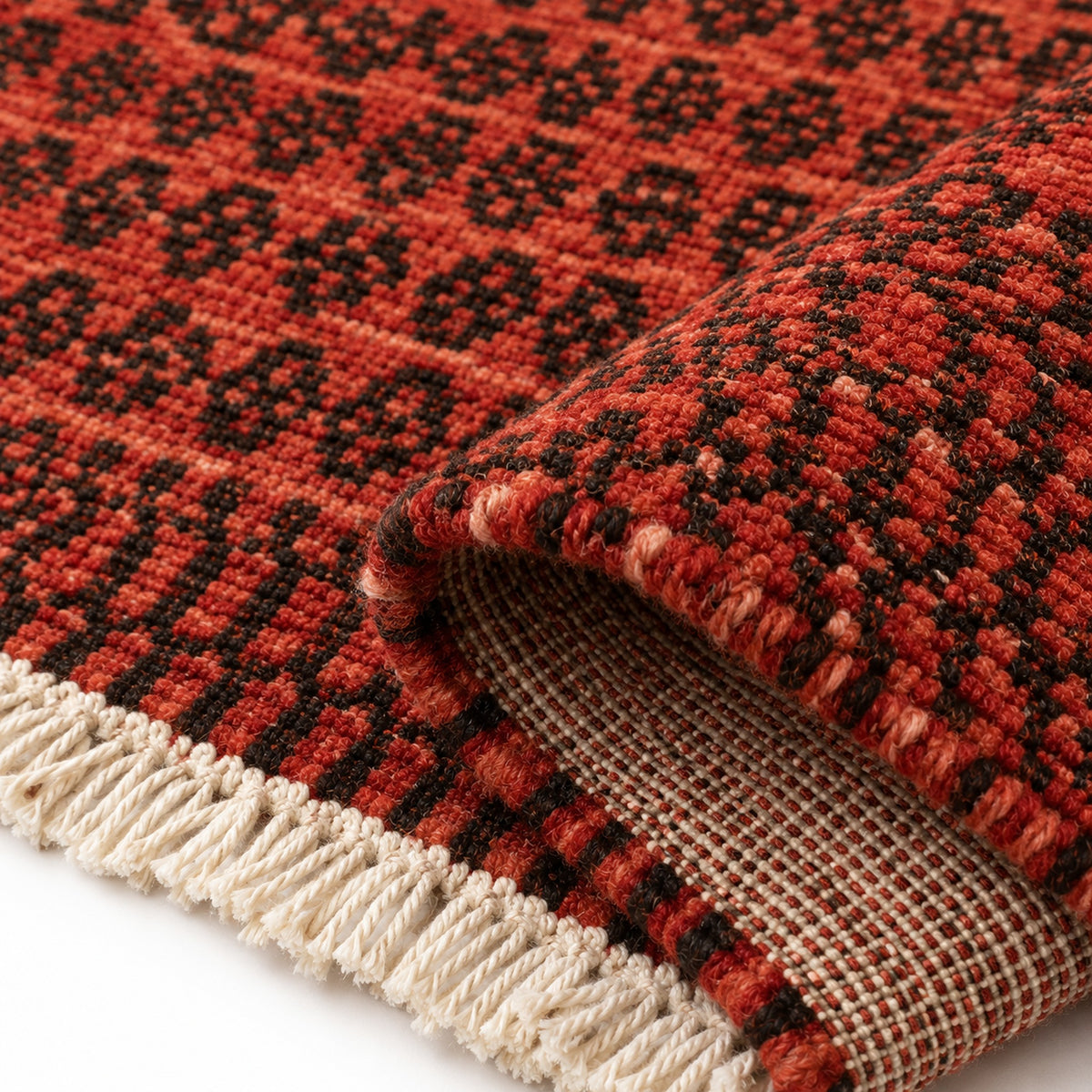 Meteo Soft Wool Hand Knotted Rug, folded corner showing the back