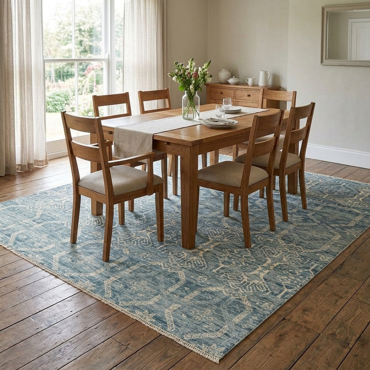 Mika Vintage Transitional Rug in a dining room