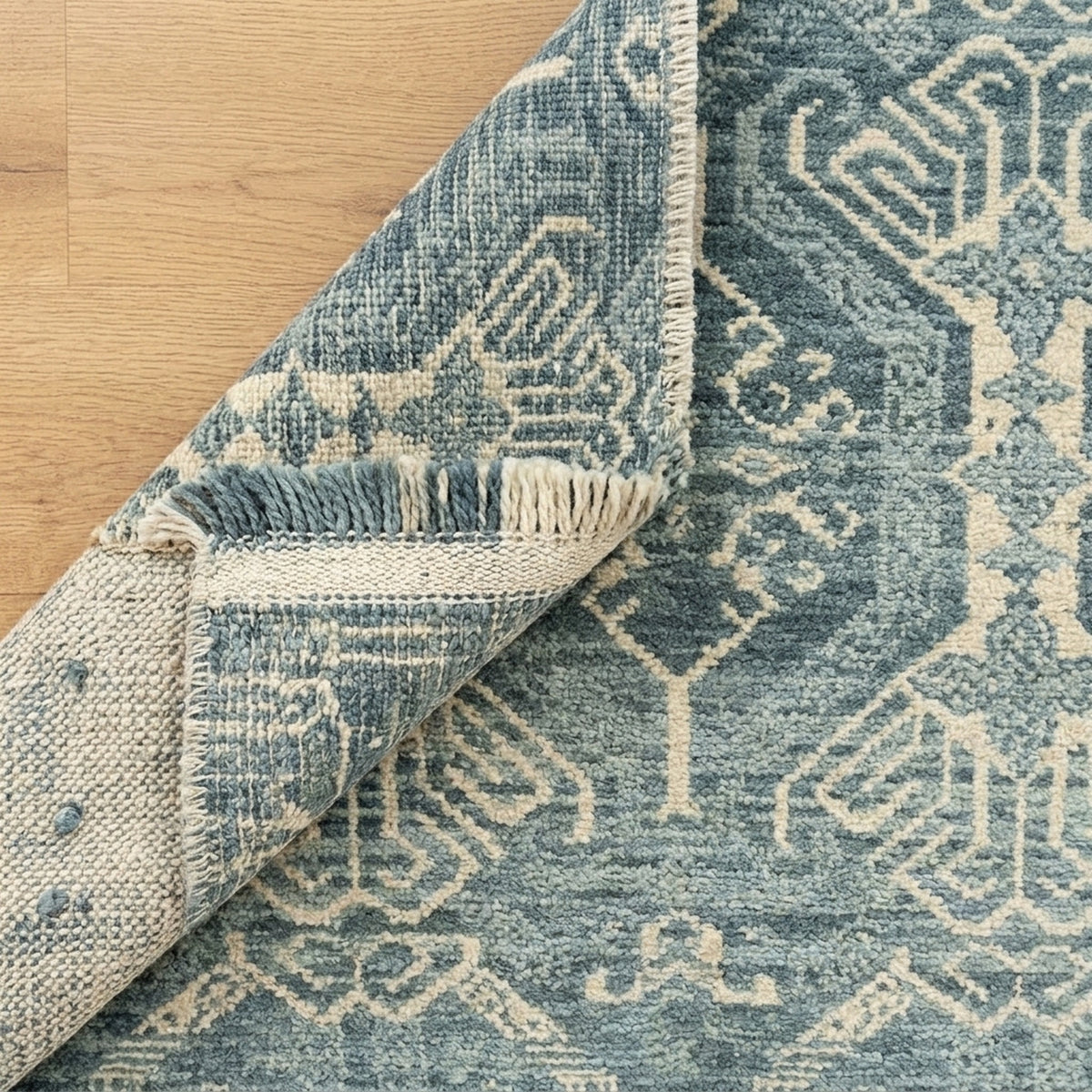 Mika Vintage Transitional Rug, folded corner showing the back