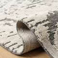Minimalist Pattern Rug, folded corner showing the back