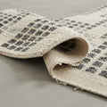 Modern Designer Checkered, folded corner showing the back
