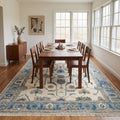 Modern Oushak Rug in a dining room