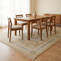 Muted Hand knotted Mamluk Design Rug in a dining room