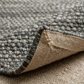 Naomi, folded corner showing the back