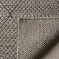 Naomi diamond, folded corner showing the back
