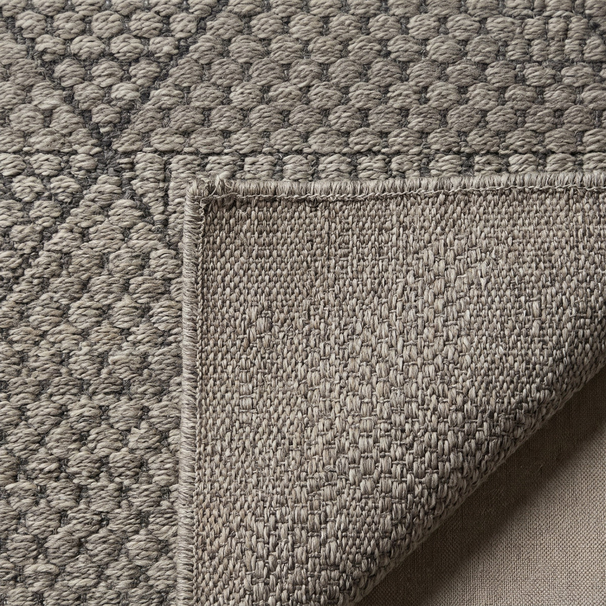 Naomi diamond, folded corner showing the back