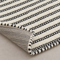Organic Jute Rug - Bleach Tones for a Cozy Ambiance, folded corner showing the back