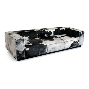 Black and White Cowhide Sofa, 83.9" x 36.2" x 29.9", shown on white