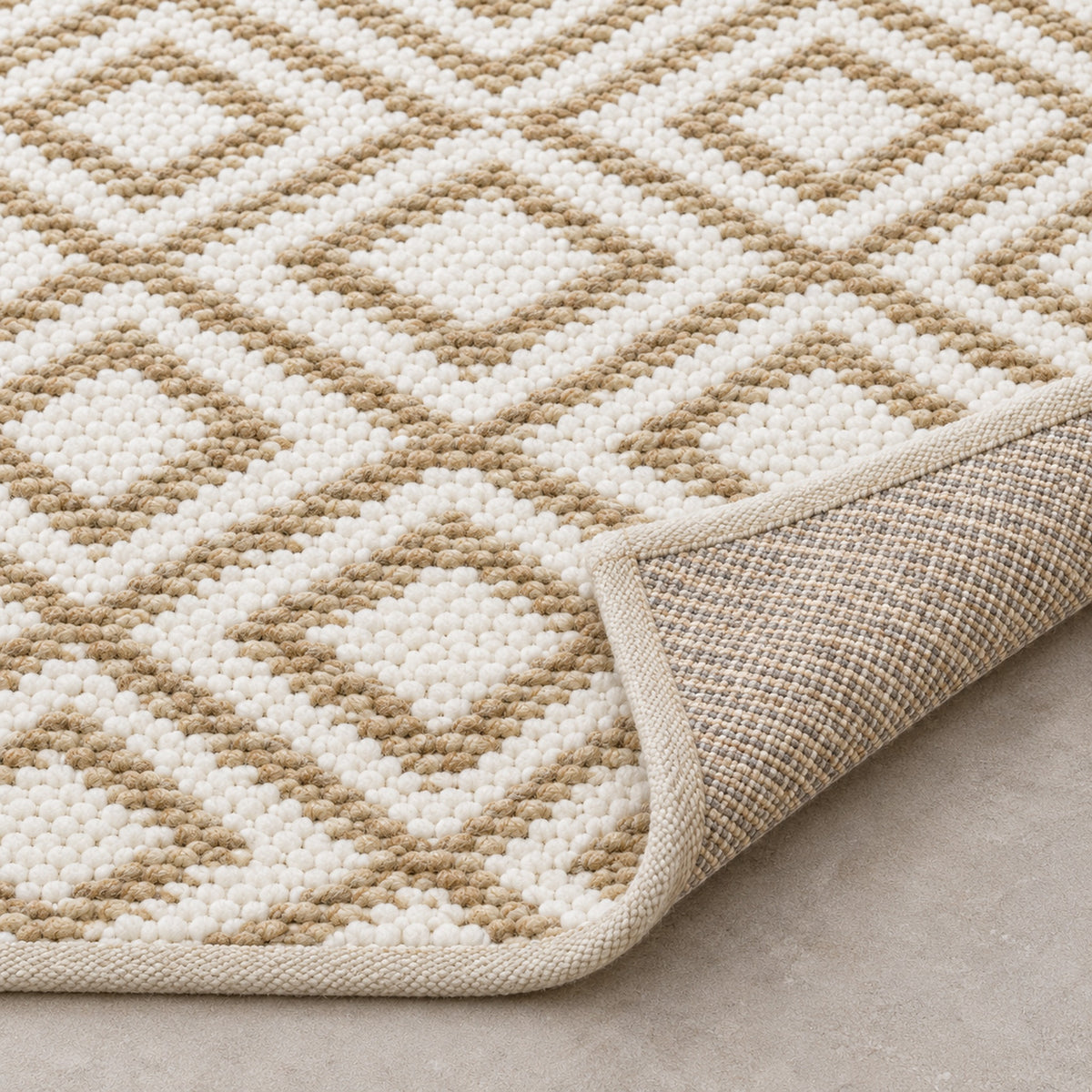 Reversible Jute Rug - Two Looks in One for Versatile Styling, folded corner showing the back