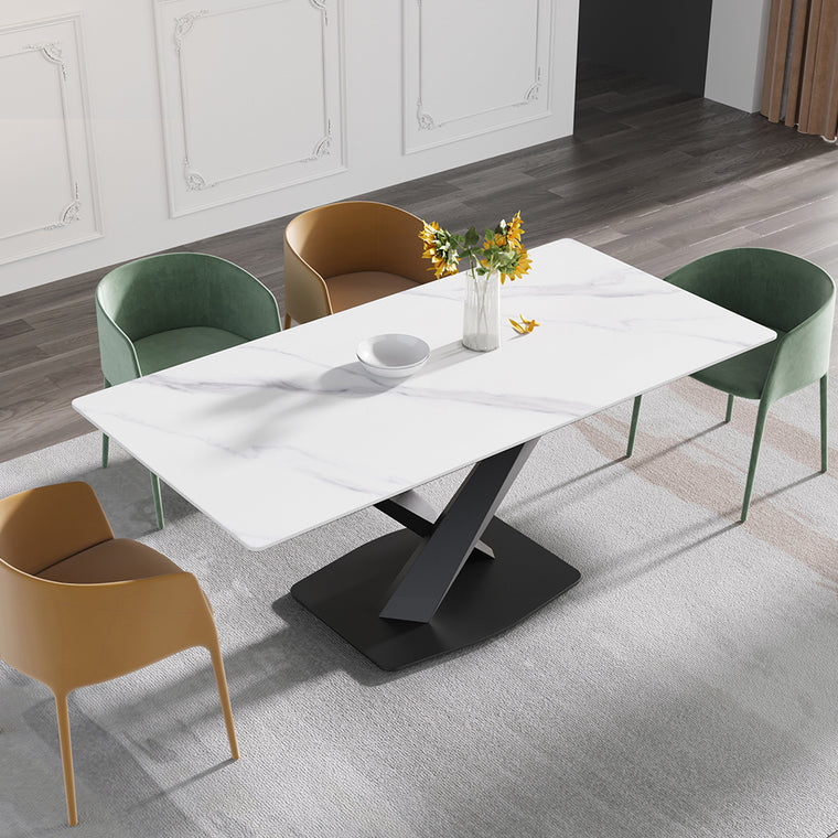Modern dining table with a stone top on a solid carbon steel base