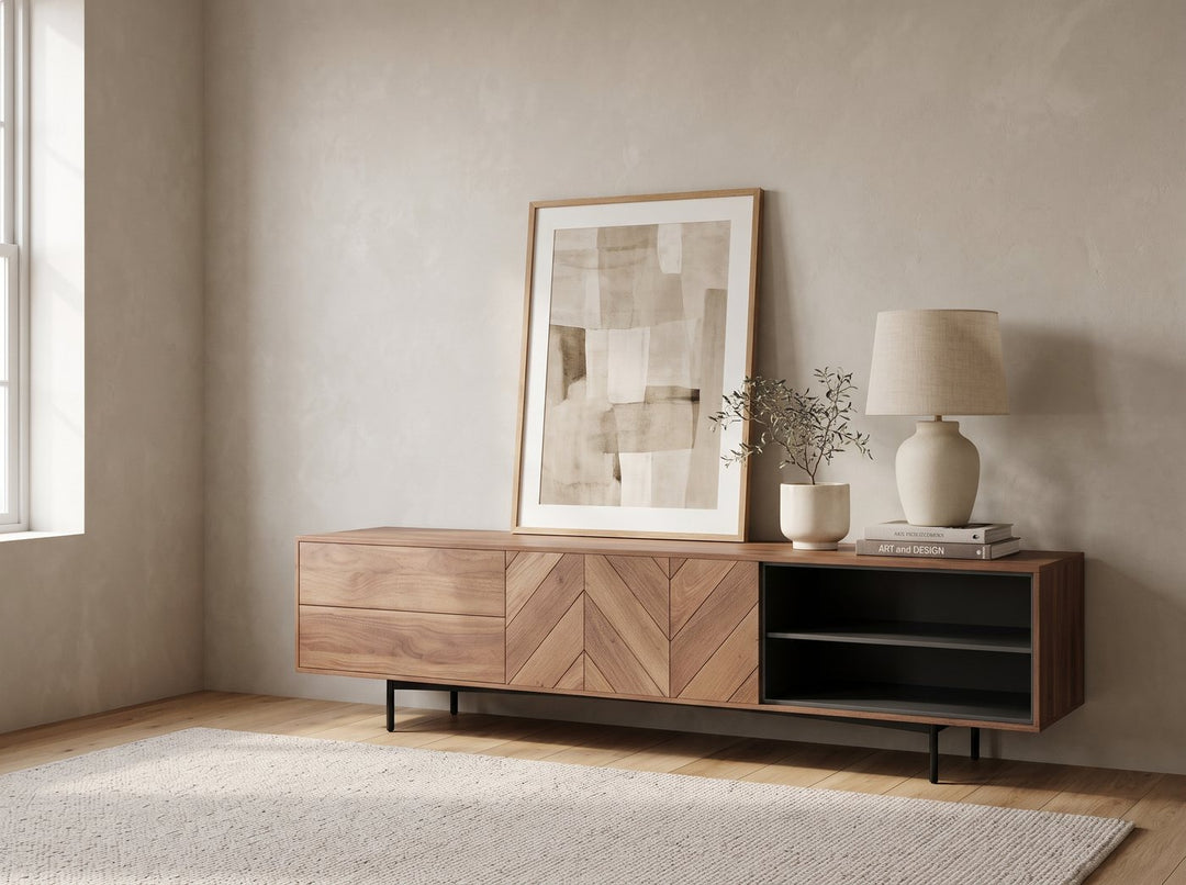 Walnut TV console with art and a lamp
